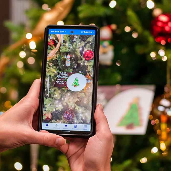 Smartphone launching a holiday-themed AR experience 